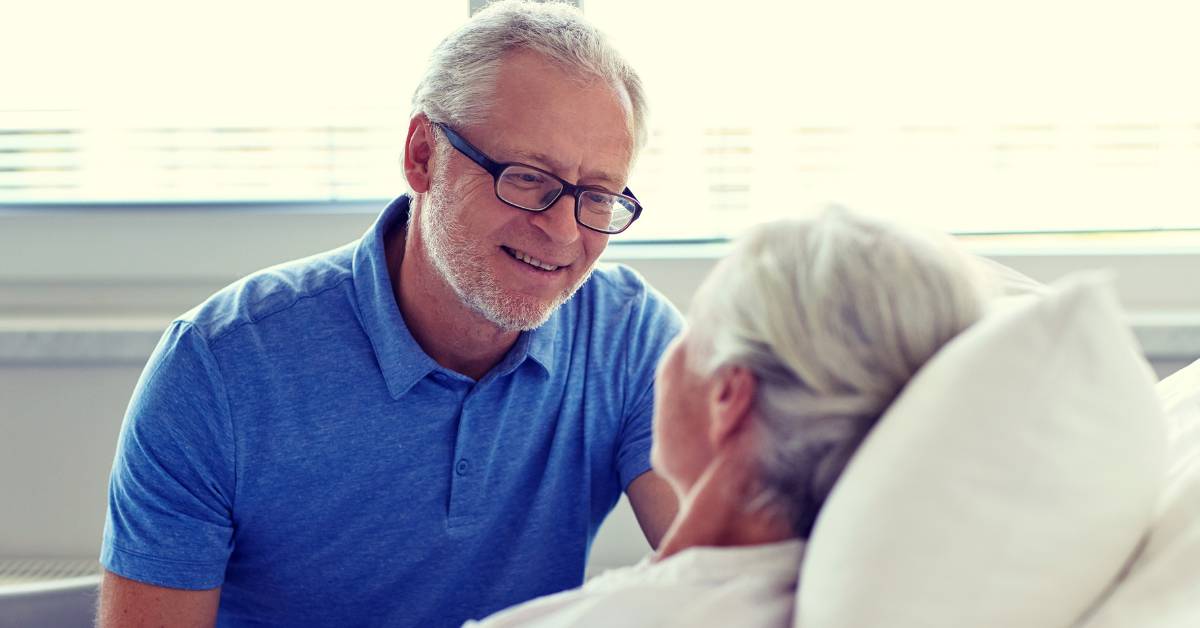 elderly adult in bed